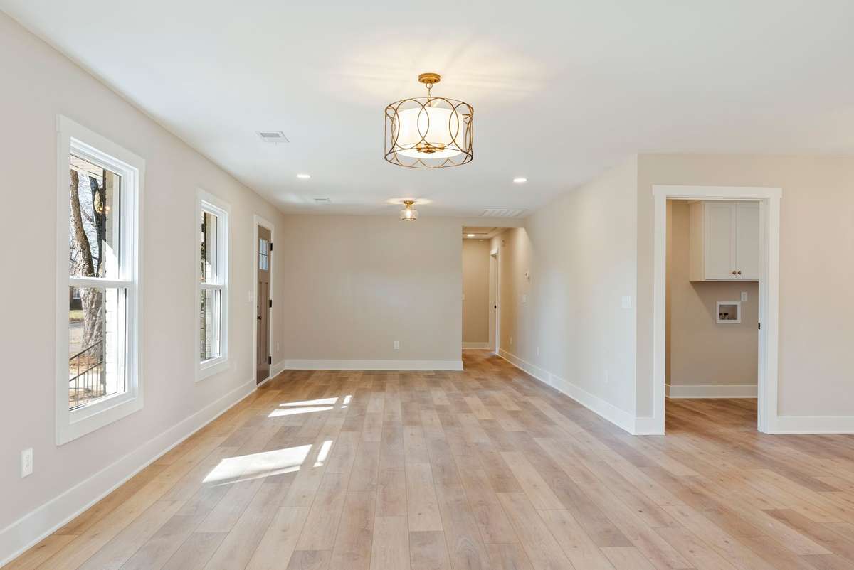 Gorgeous and durable luxury vinyl plank flooring flows throughout the entire home! 510 Iris Avenue, Murfreesboro, TN 37128