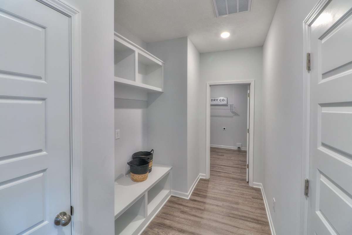 Hallway to Laundry w/ Drop Zone