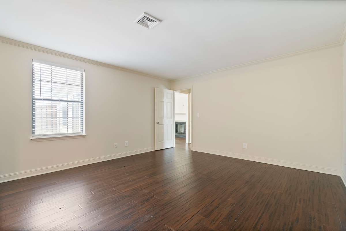 Primary Bedroom with view to Family Room/Den