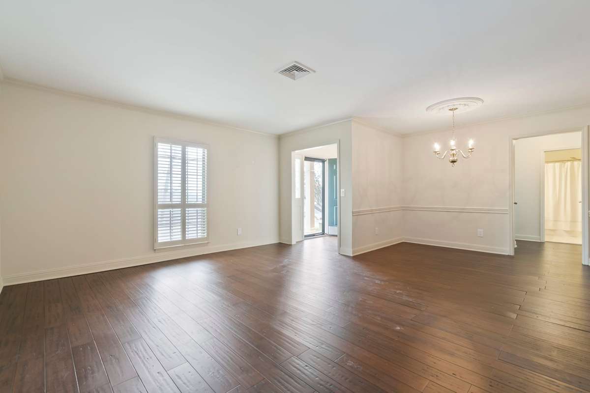 Front Living Room with view to front door and Dining