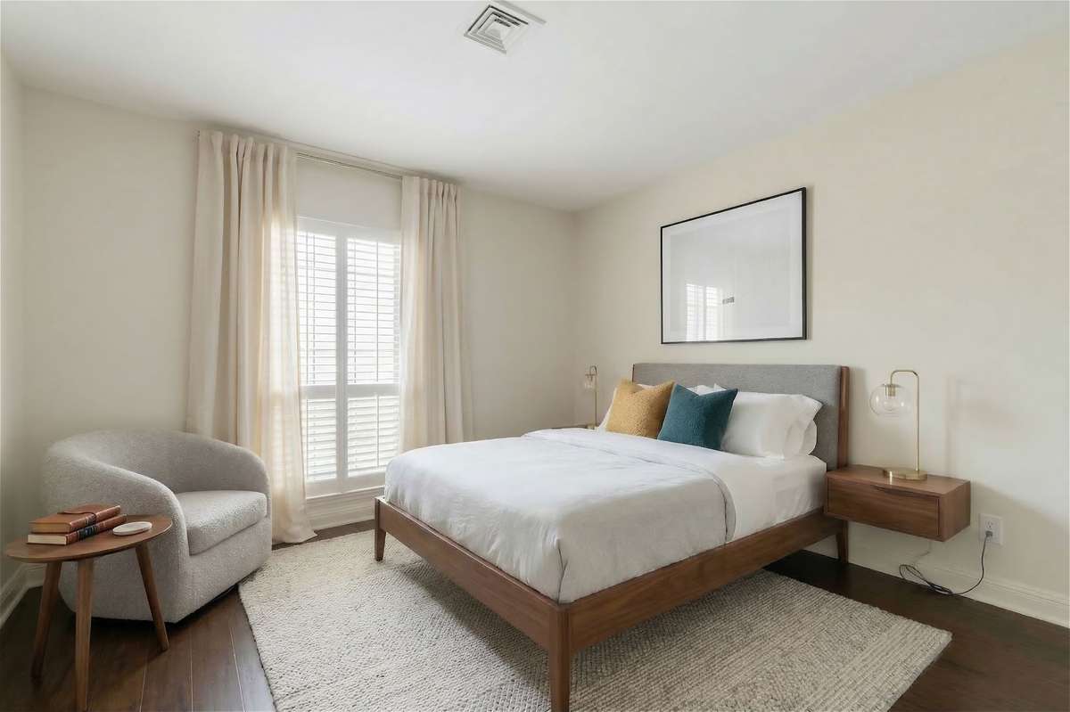 this secondary bedroom has been virtually staged
