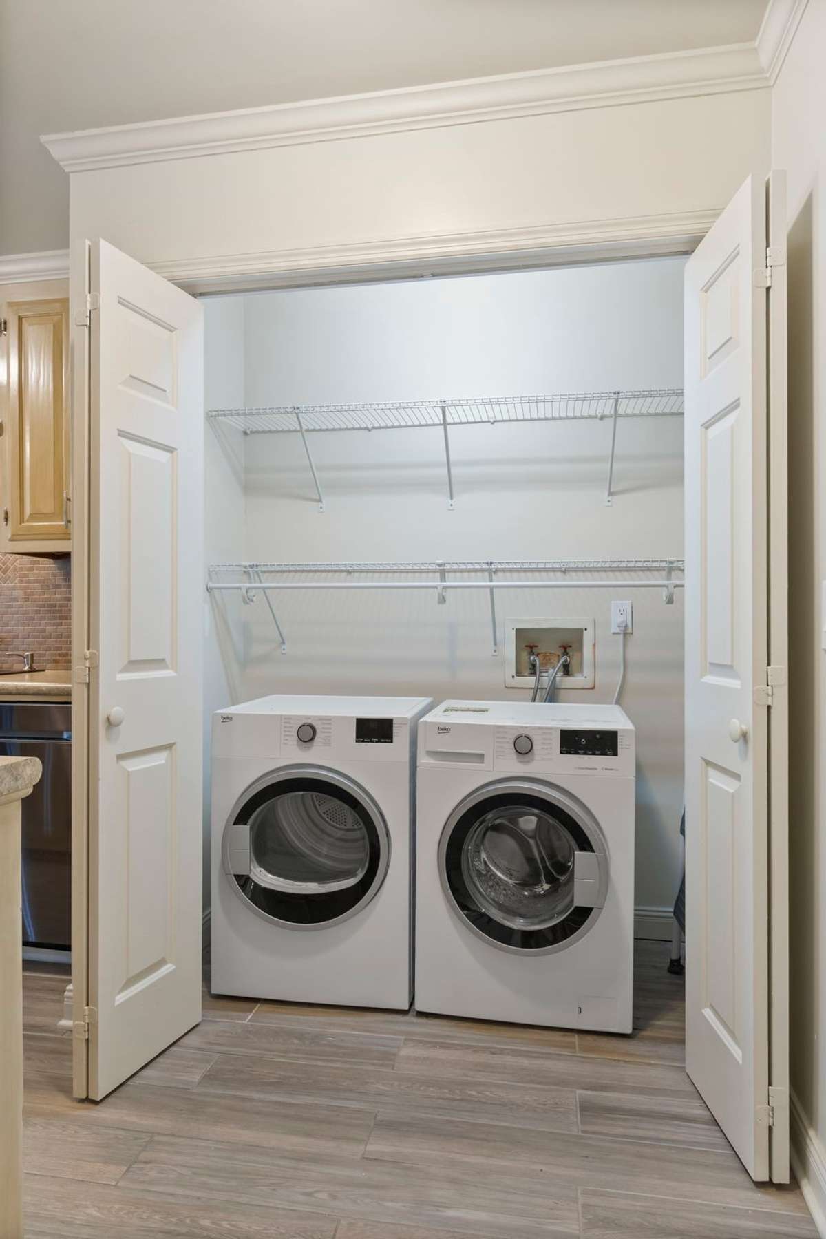 Laundry closet in kitchen