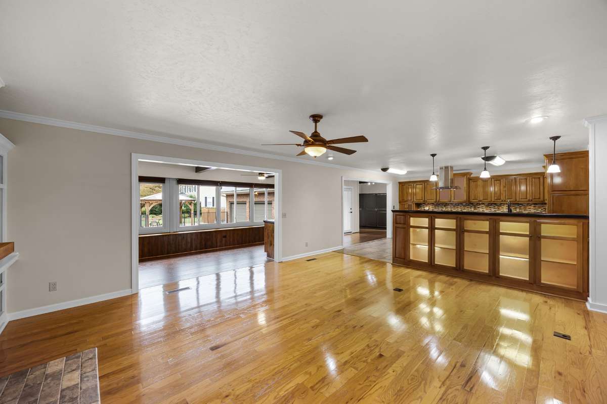 Living Room View to Kitchen & Sunroom