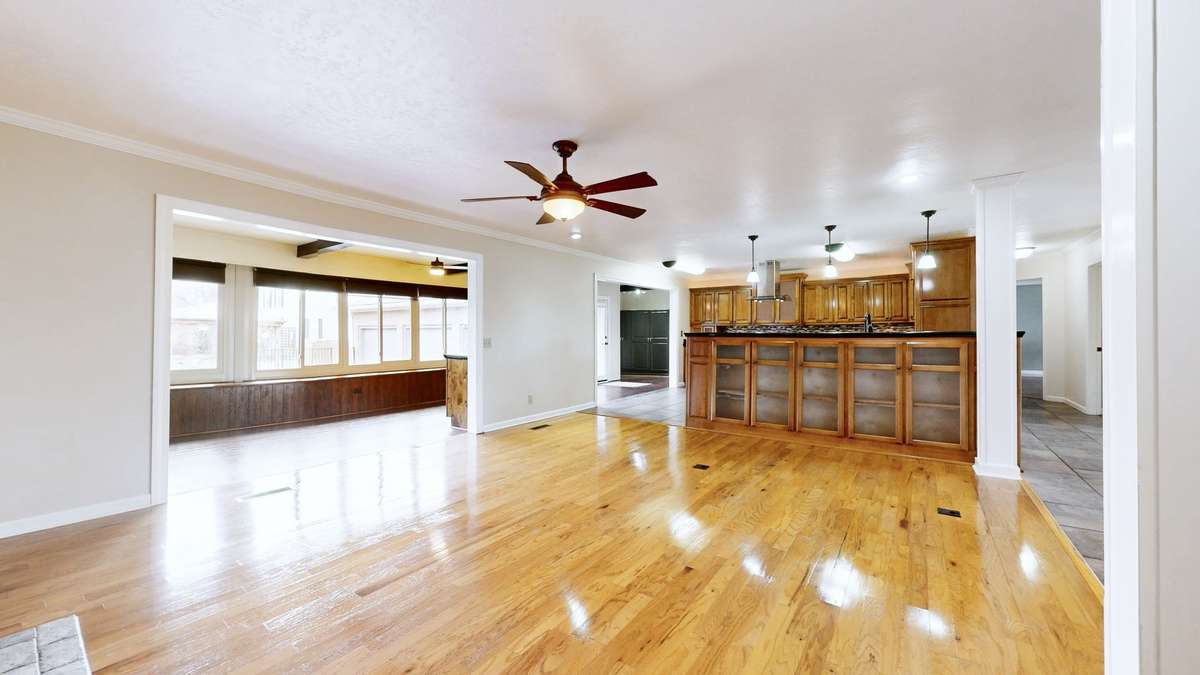 Living Room View to Kitchen & Sunroom