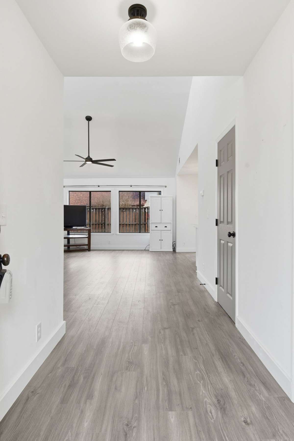 From the front door, step into your open concept living room and kitchen.