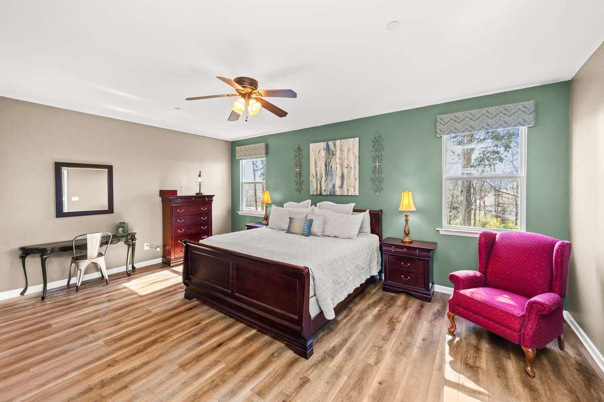 Spacious primary bedroom located on the main level of this home