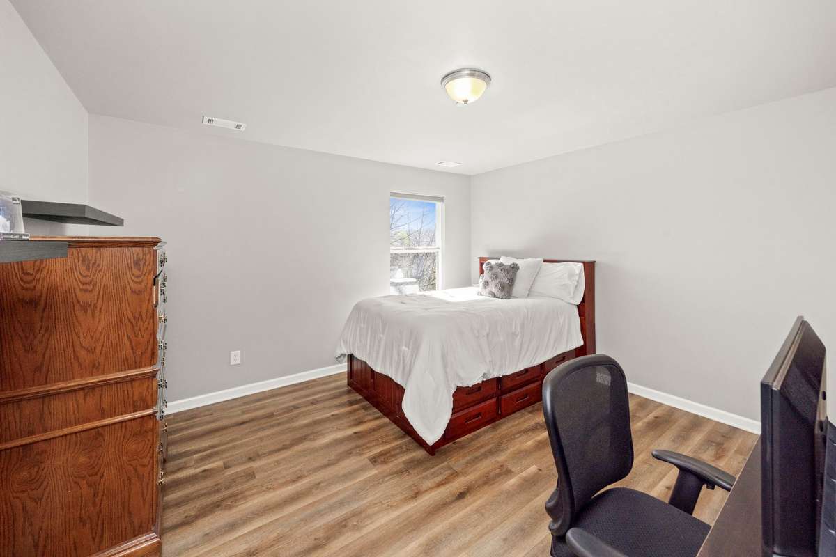 Bedroom three on the second level with LVP flooring