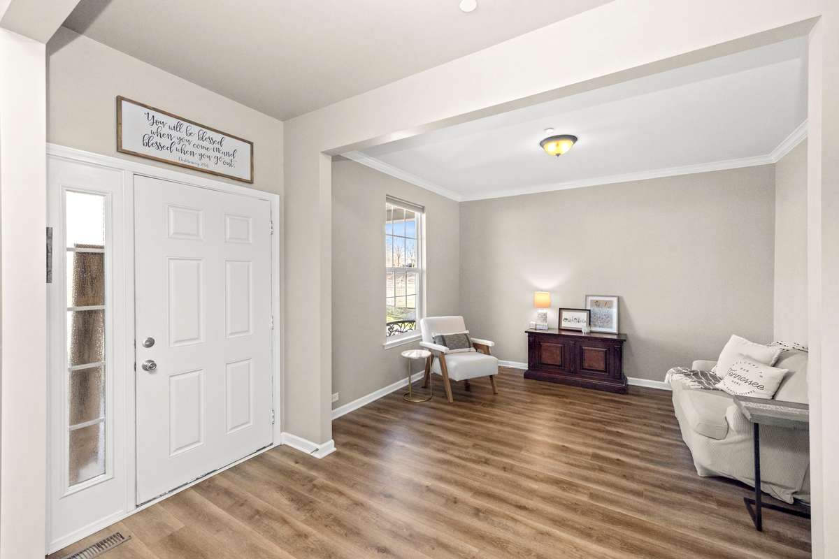Front sitting room as you enter the home