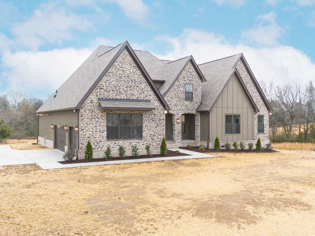 Photo from a previous version of the same plan. Buyer of lot 25 will be able to make selections!