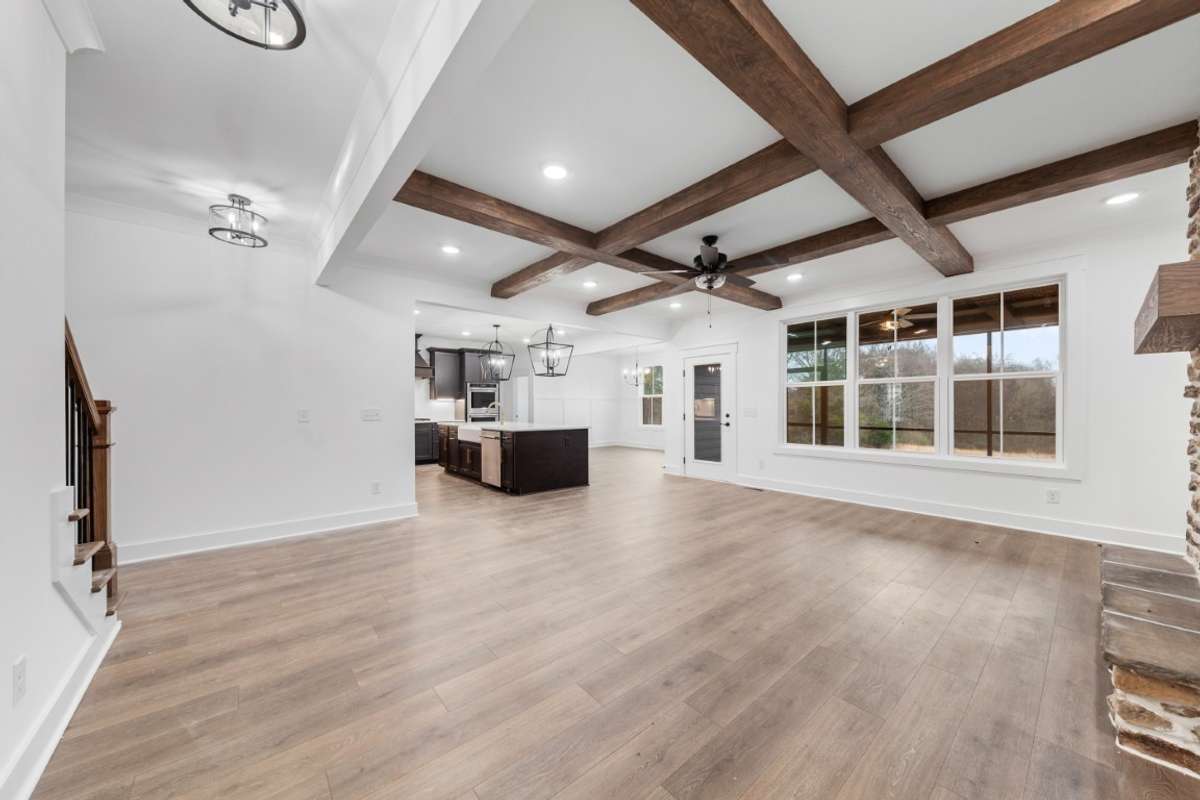 Photo from a previous version of the same plan. Buyer of lot 25 will be able to make selections!