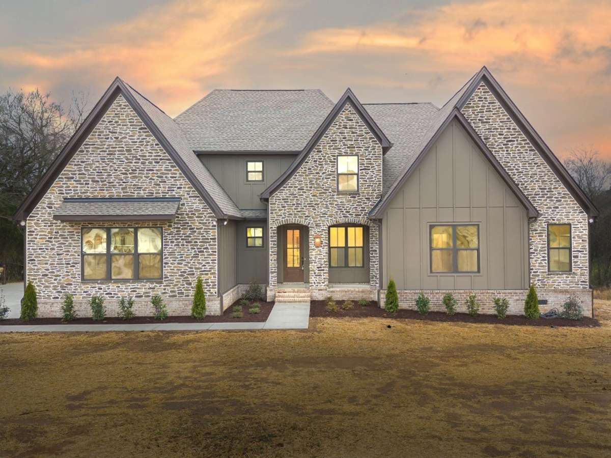 Photo from a previous version of the same plan. Buyer of lot 25 will be able to make selections!