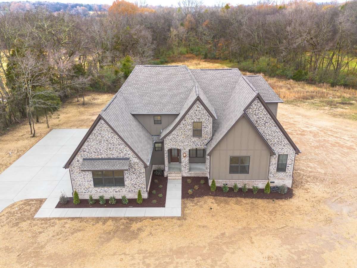 Photo from a previous version of the same plan. Buyer of lot 25 will be able to make selections!