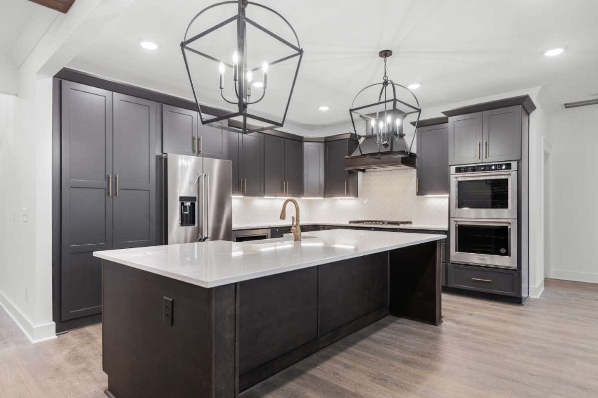 Photo from a previous version of the same plan. Buyer of lot 25 will be able to make selections!