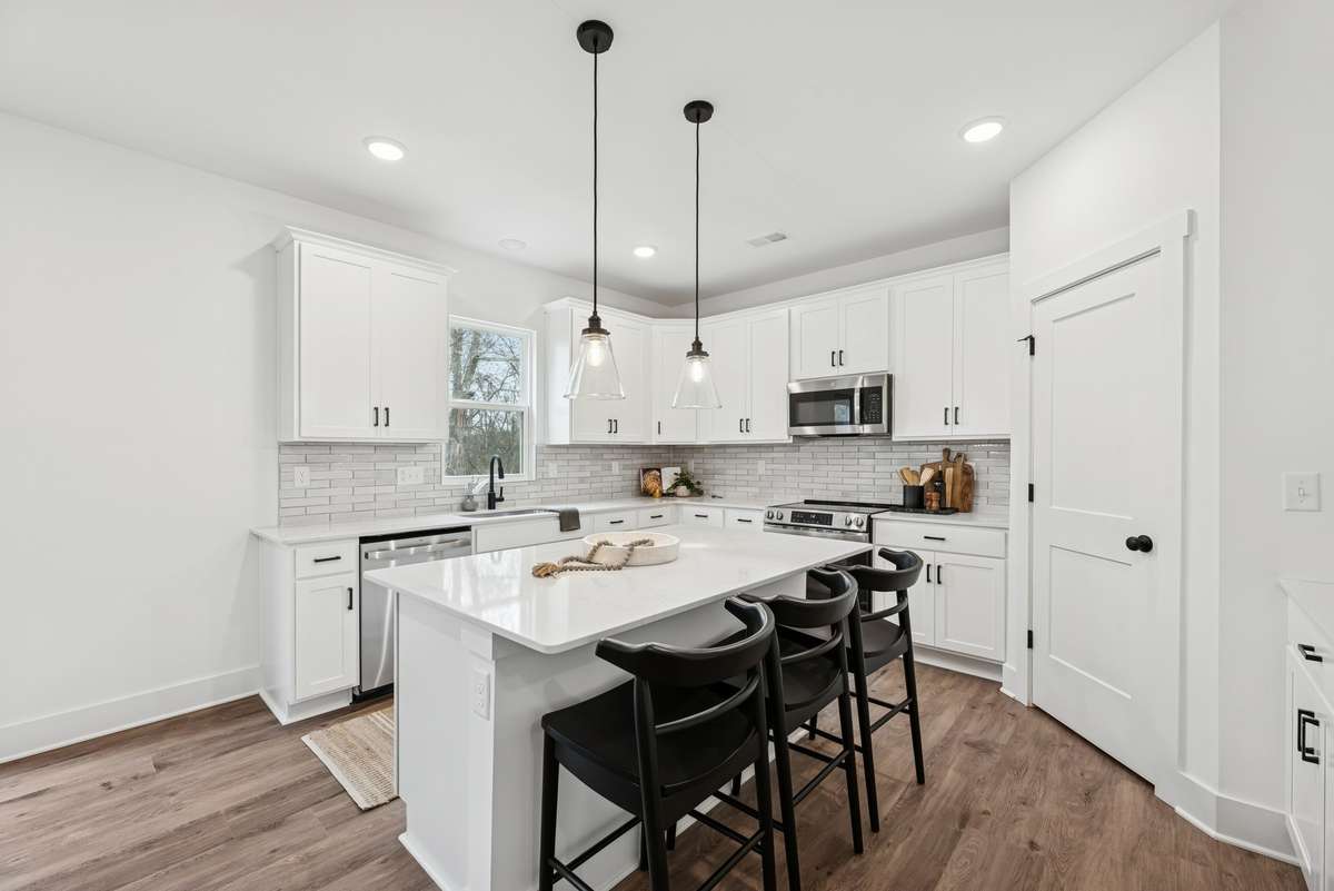 Photos are of a previously built floorplan. Exterior, structural and design options to be chosen during the design appointment after contract.