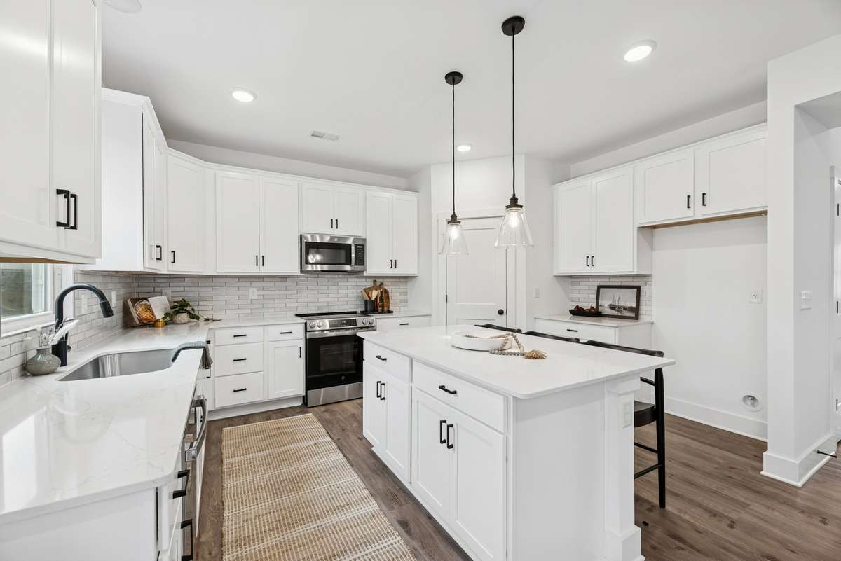Photos are of a previously built floorplan. Exterior, structural and design options to be chosen during the design appointment after contract.