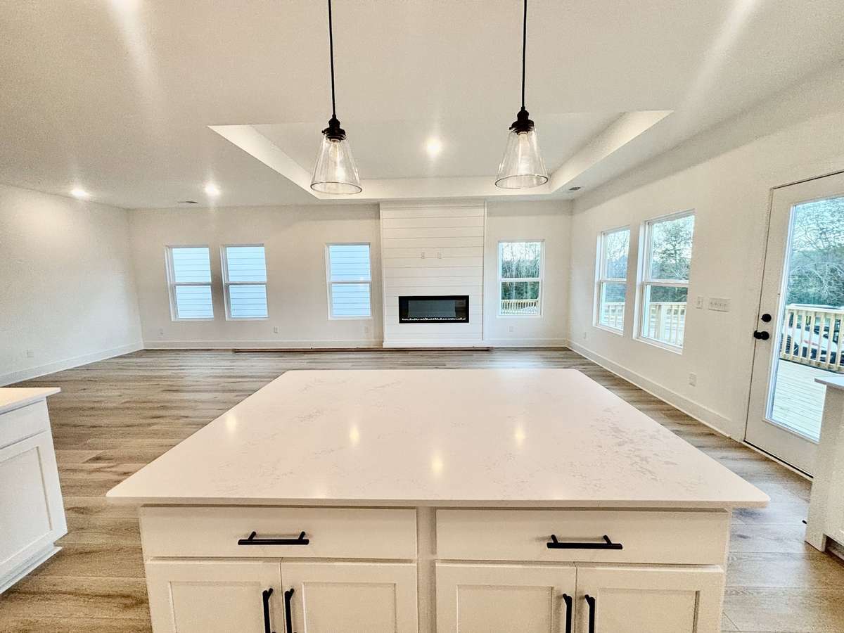 Huge island is the focal pointPhotos are of a previously built floorplan. Exterior, structural and design options to be chosen during the design appointment after contract.