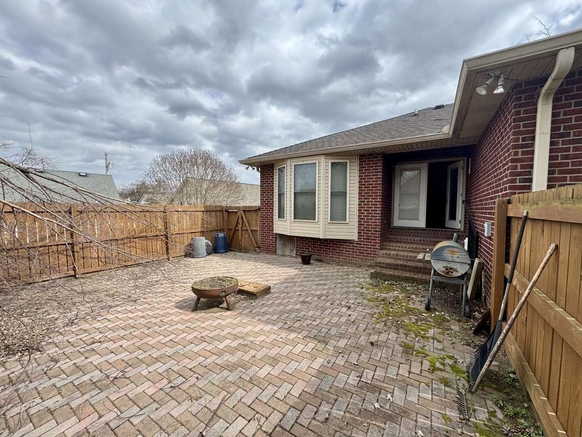 Rear Fenced in Patio Area