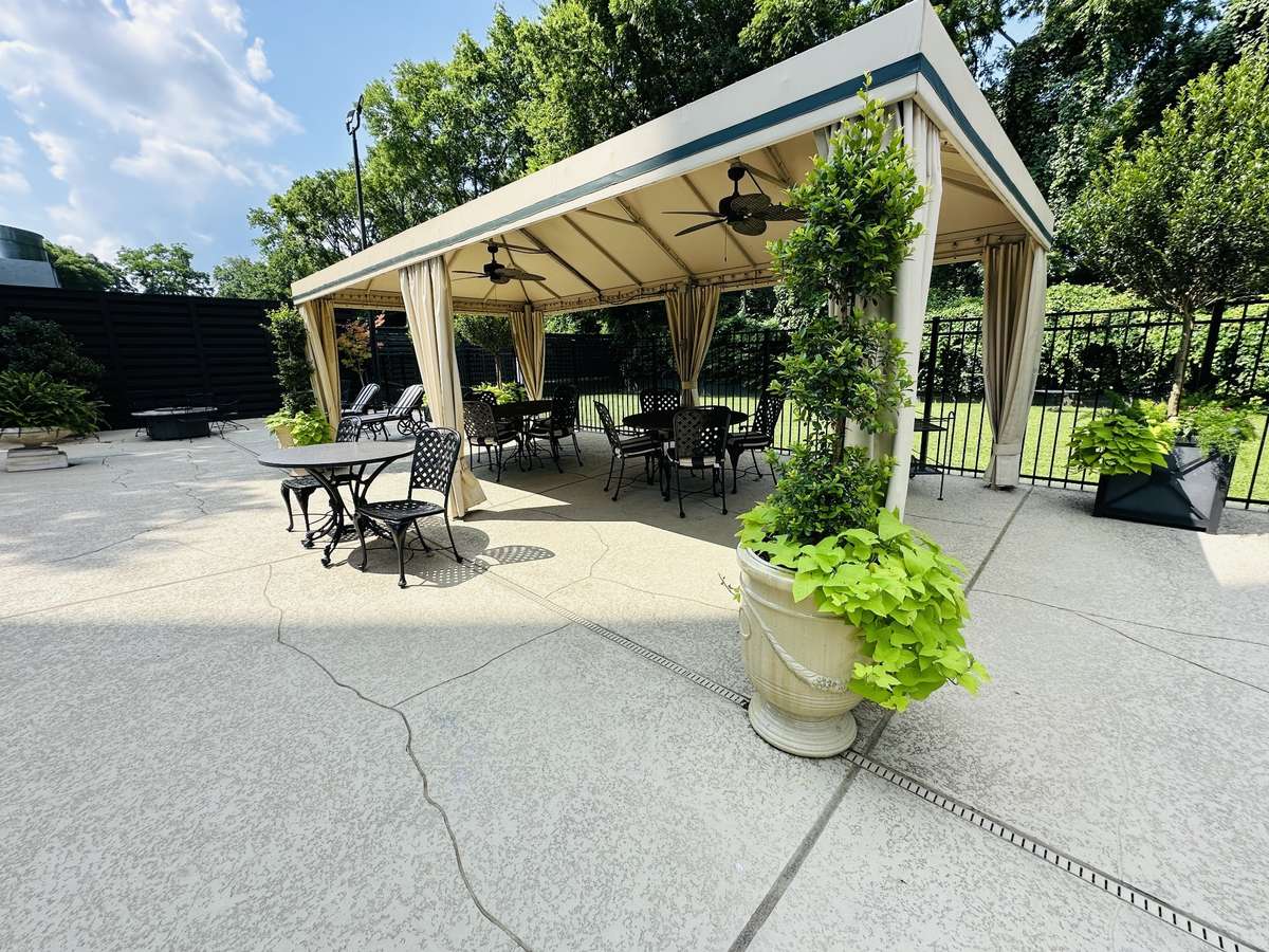 Cabana in outdoor pool area.