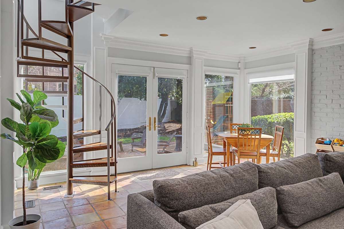 Recessed lighting and full view to backyard.