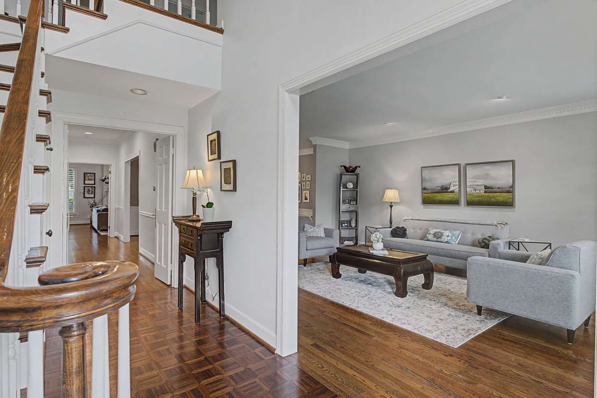 View to living room and hallway to back rooms.