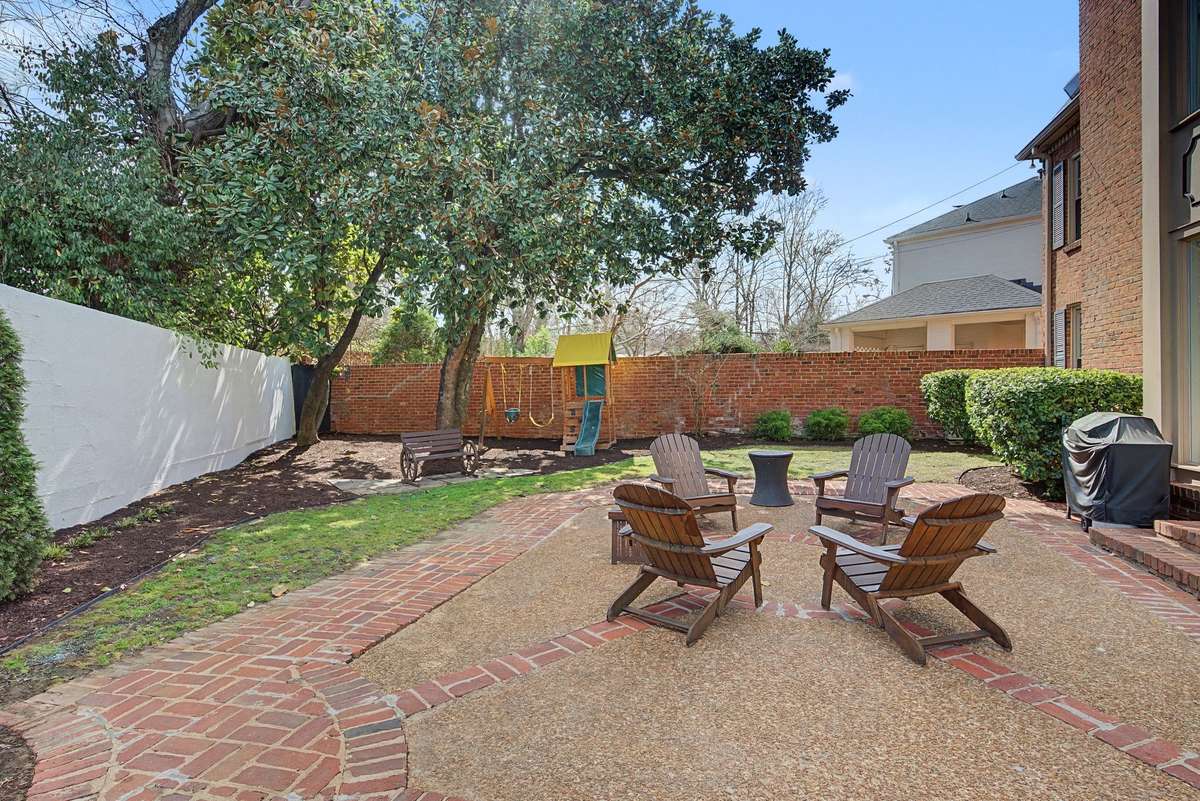 Brick paver and aggregate patio.