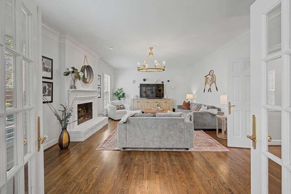 Big main floor Den with fireplace.