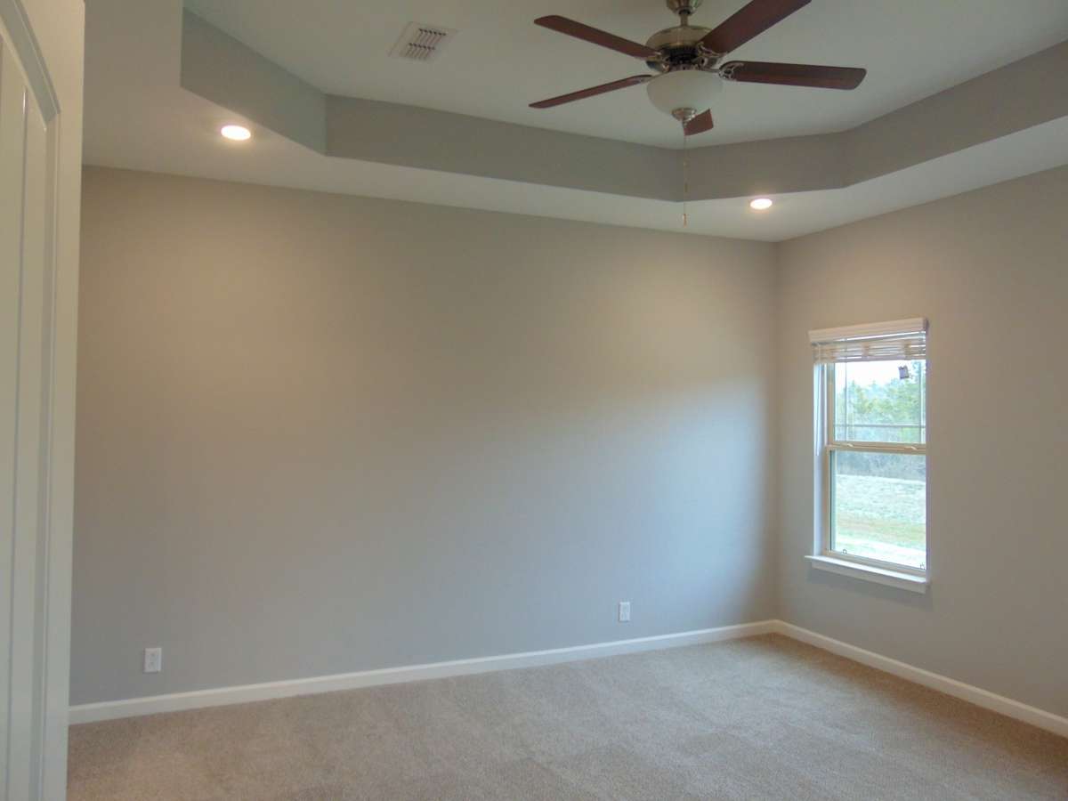 Owners Suite with Trey Ceilinfg and Fan. File Photo