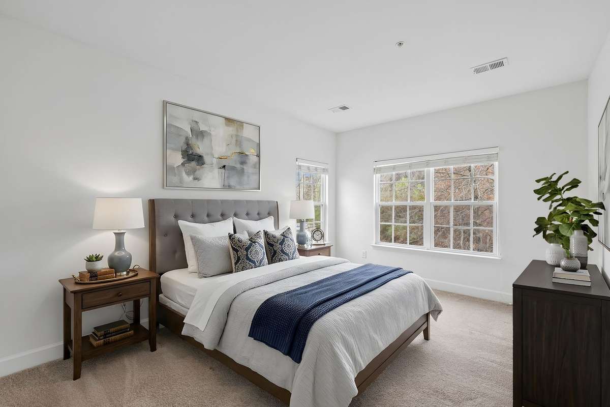 Large primary bedroom - This photo has been virtually staged