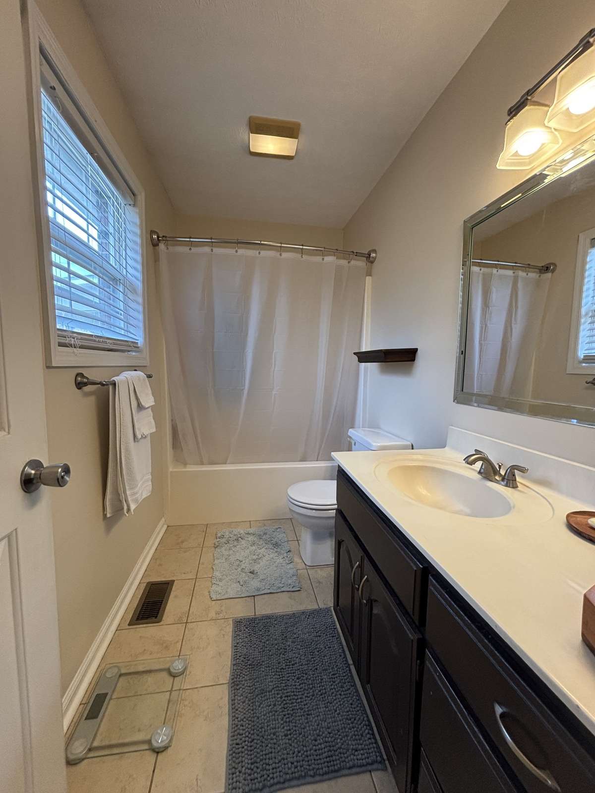 Primary Bath has Tub/Shower Combination and Tile Flooring