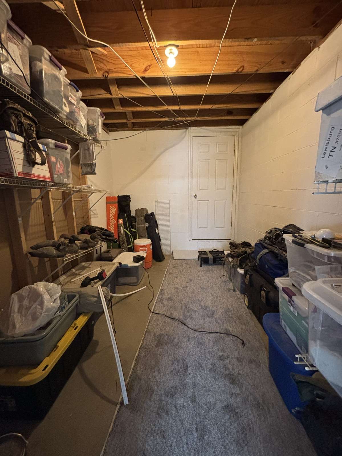 Storage Room in Basement leading to Encapsulated Crawl Space