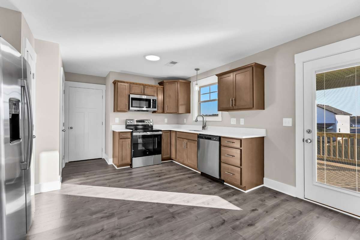Example photo of a recently completed Baker floor plan. Colors, selections, and finishes may vary based on availability.