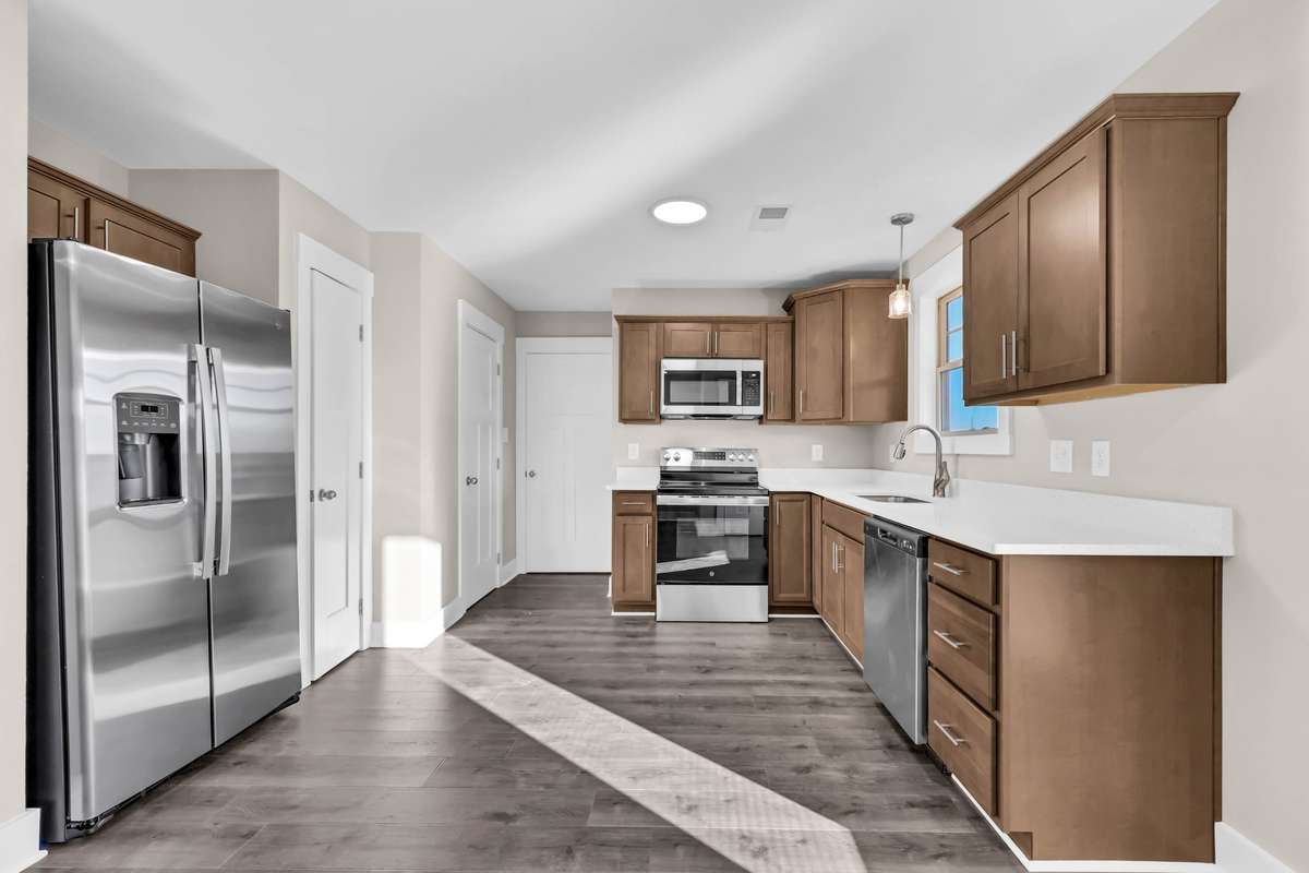 Example photo of a recently completed Baker floor plan. Colors, selections, and finishes may vary based on availability.