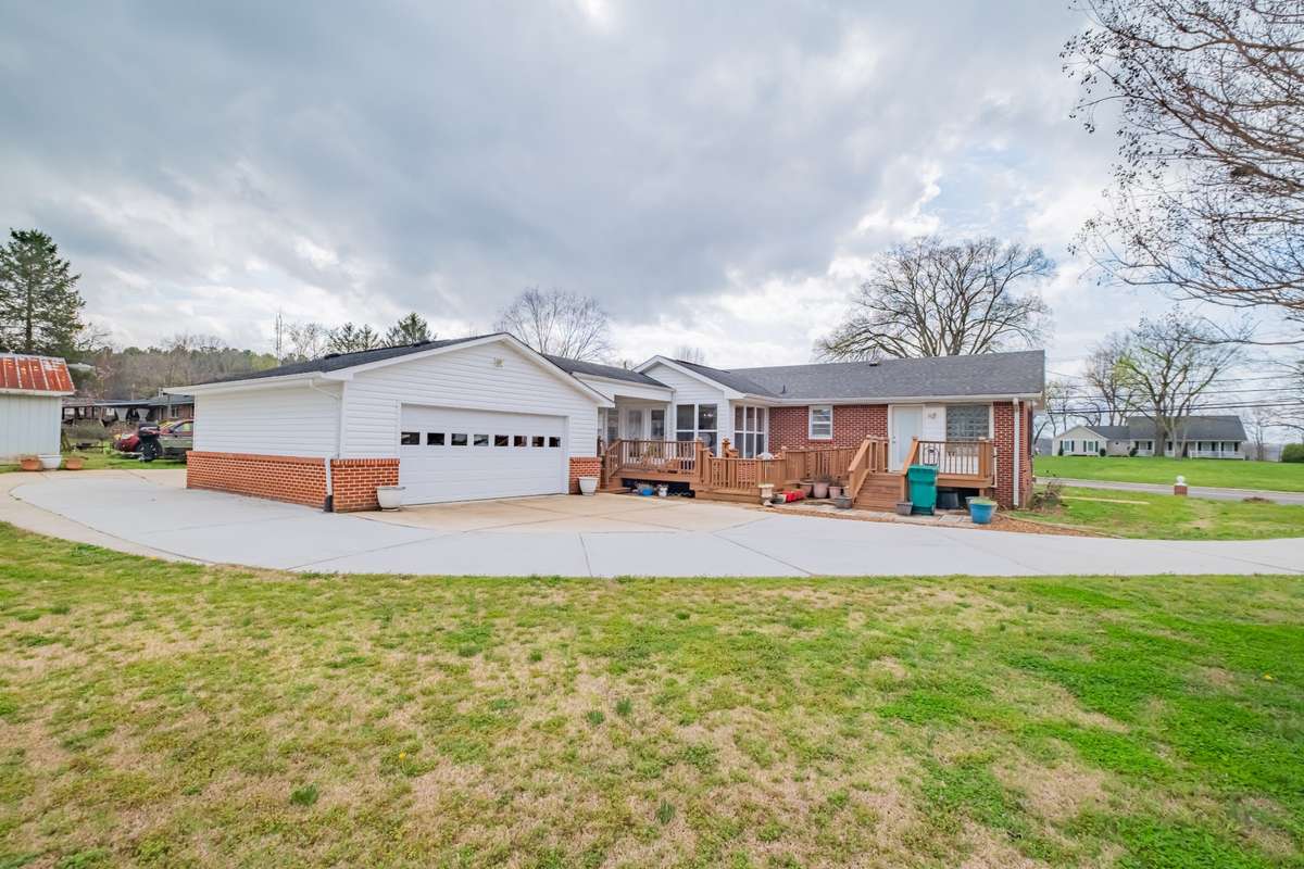 Detached Garage has doors on each end for easy pull through - no backing required.