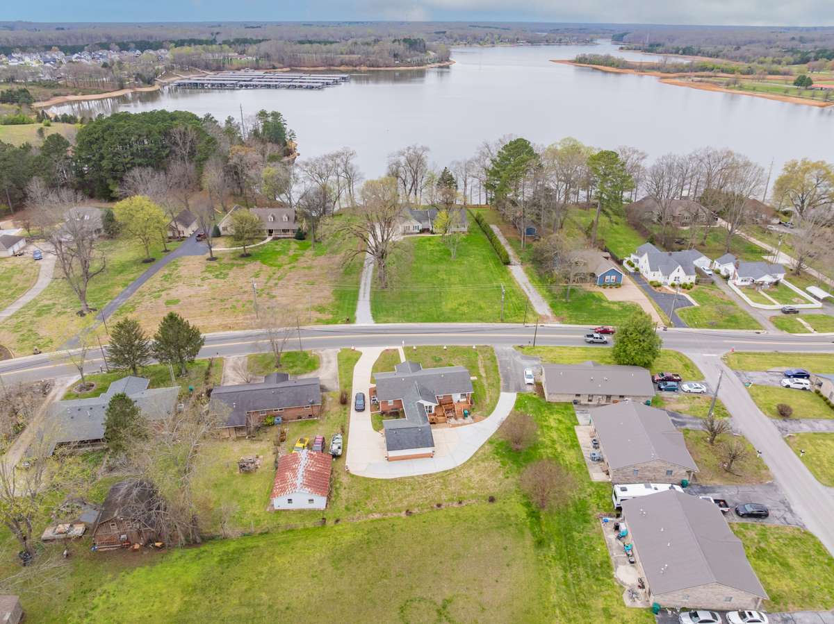 The lake is viewable from the home and the front porch! You can be enjoying the Lake and or the City Park within minutes from this home.