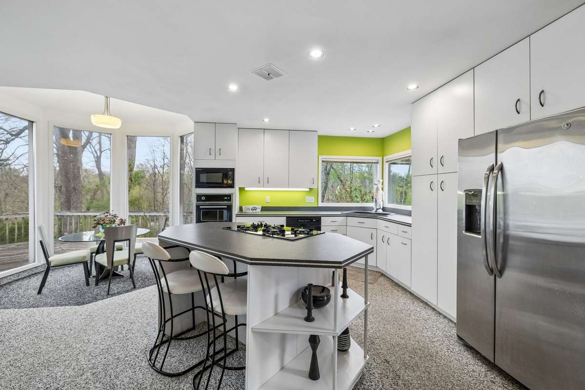 Another view of the kitchen showing the step down gazebo dining area