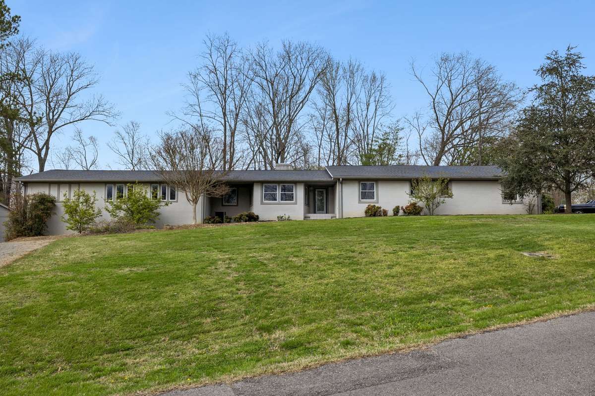 Welcome to 558 Chesterfield Dr. A modern style home in a tree lined setting. Large front & back yard. Additional side gravel drive for detached garage & backyard access.