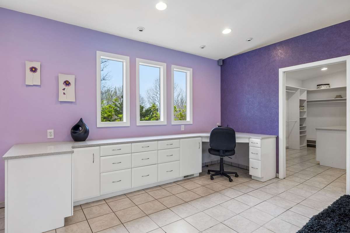 Desk area with silestone countertop and plenty of drawers & cabinets