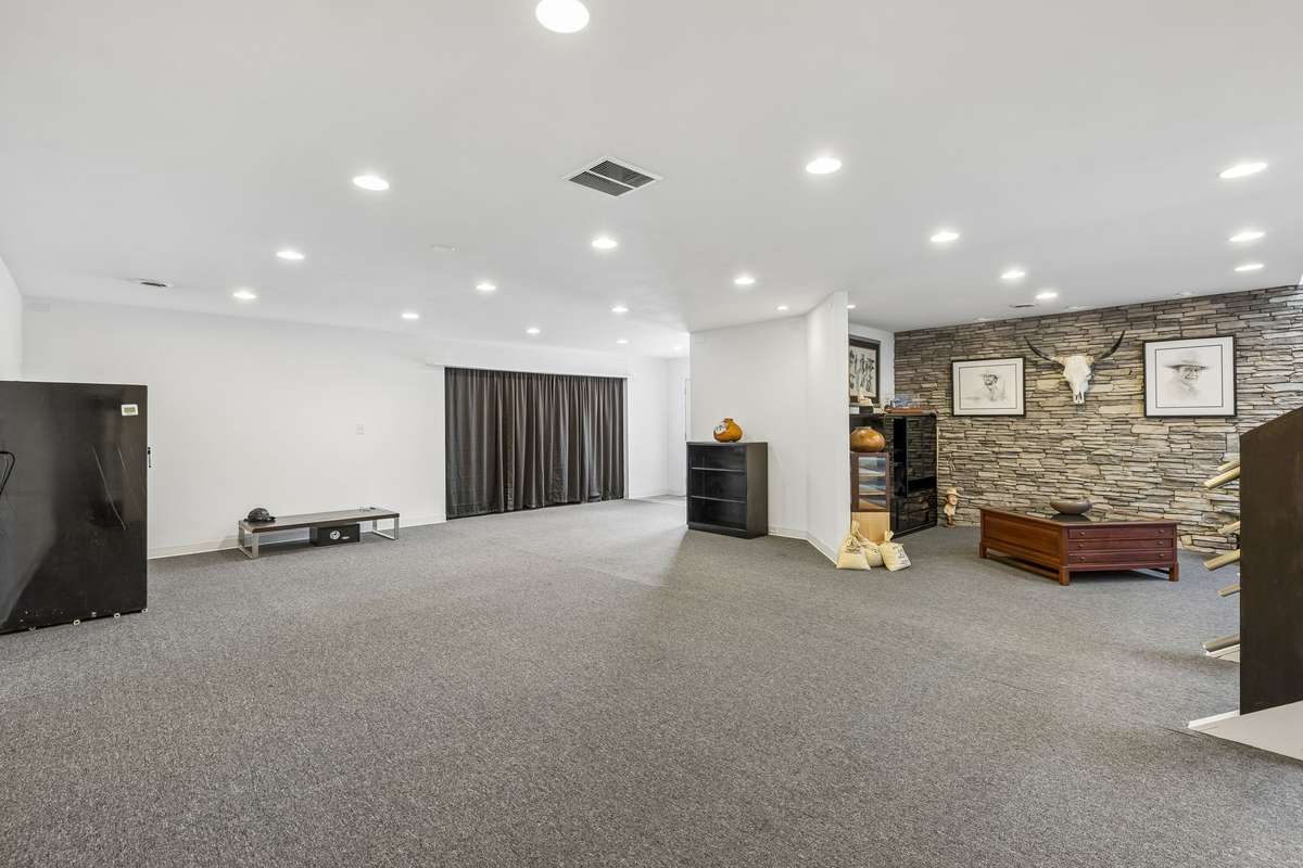 Huge area for game room, exercise room. Man Cave. Lots of potential