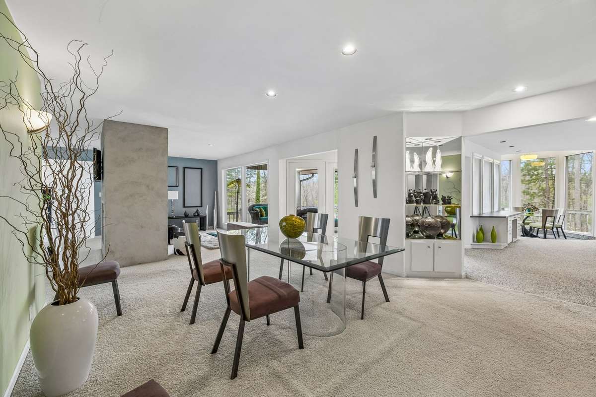 Another view of the living/dining area leading to the kitchen