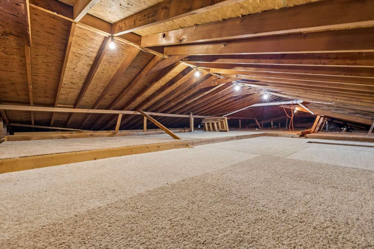 Large attic with carpeted floor