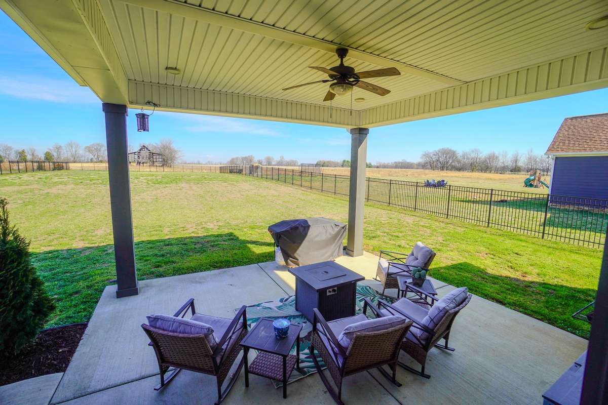 Just look at this back yard! Plenty of space for fun, a garden, or whatever your need might be.
