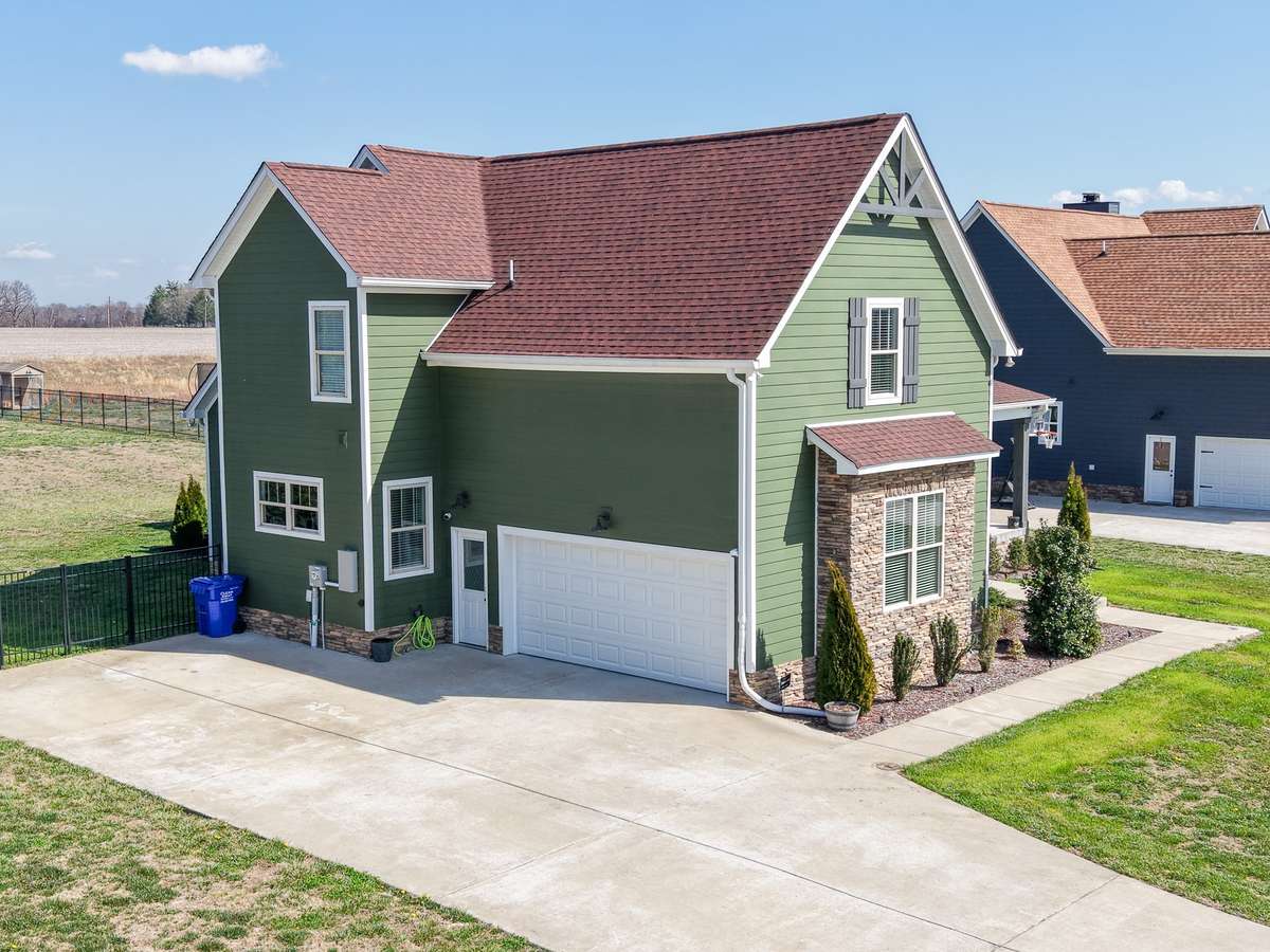 Side view showing the 2 car garage