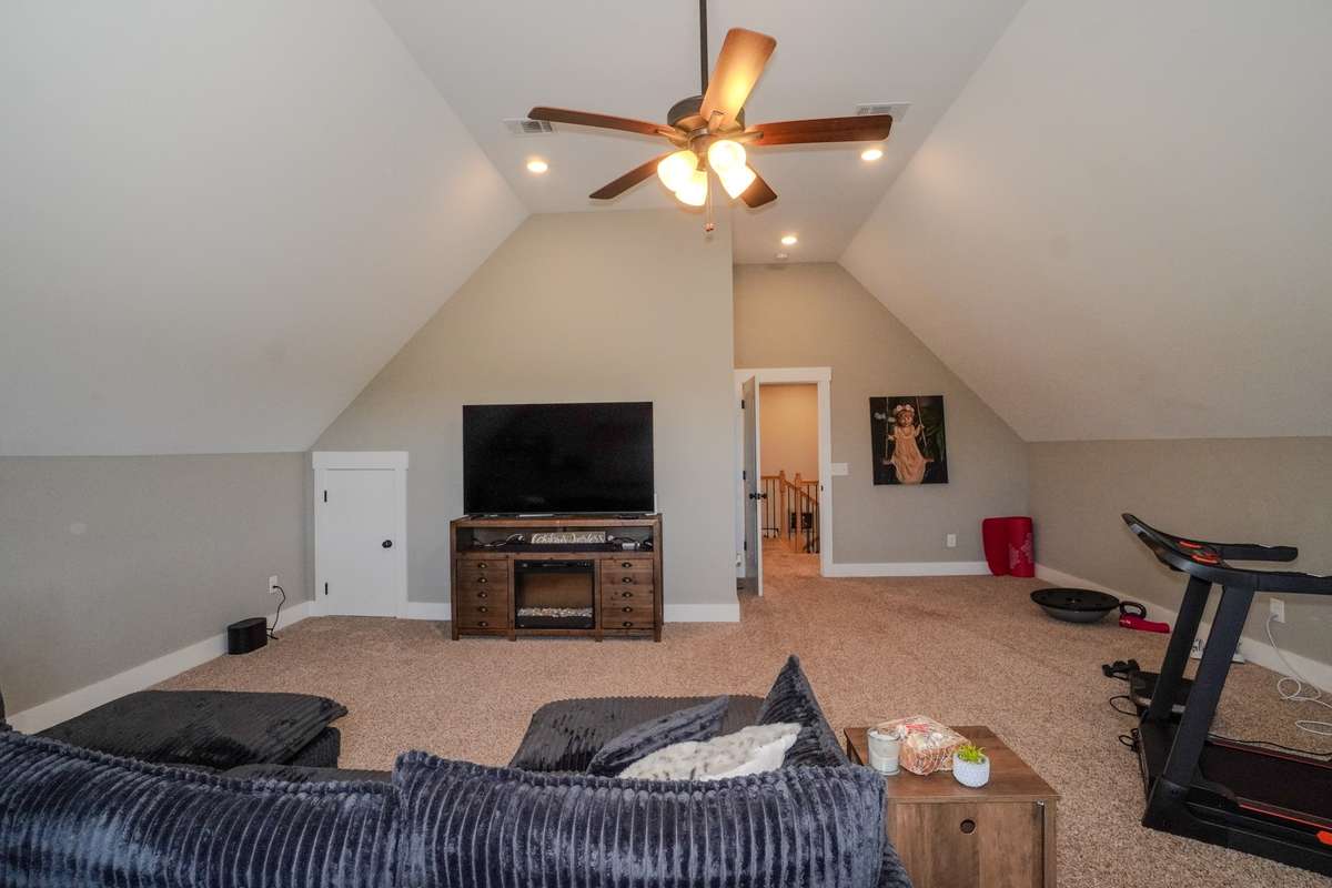 A large bonus room is located over the garage
