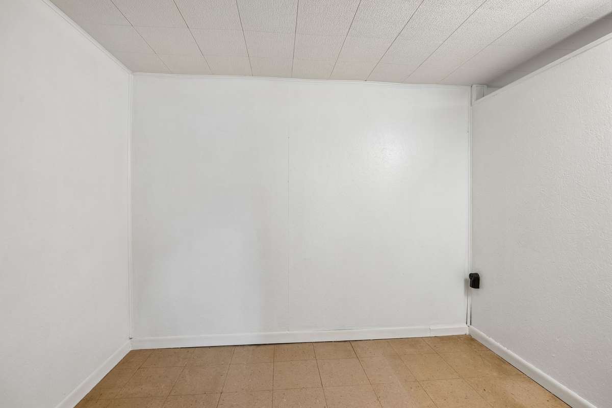 Additional storage or flex room in the basement.