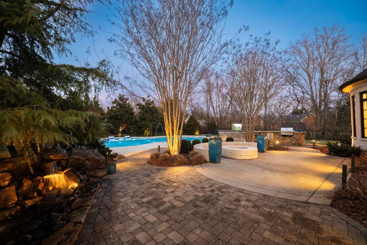 Custom landscape lighting throughout the property