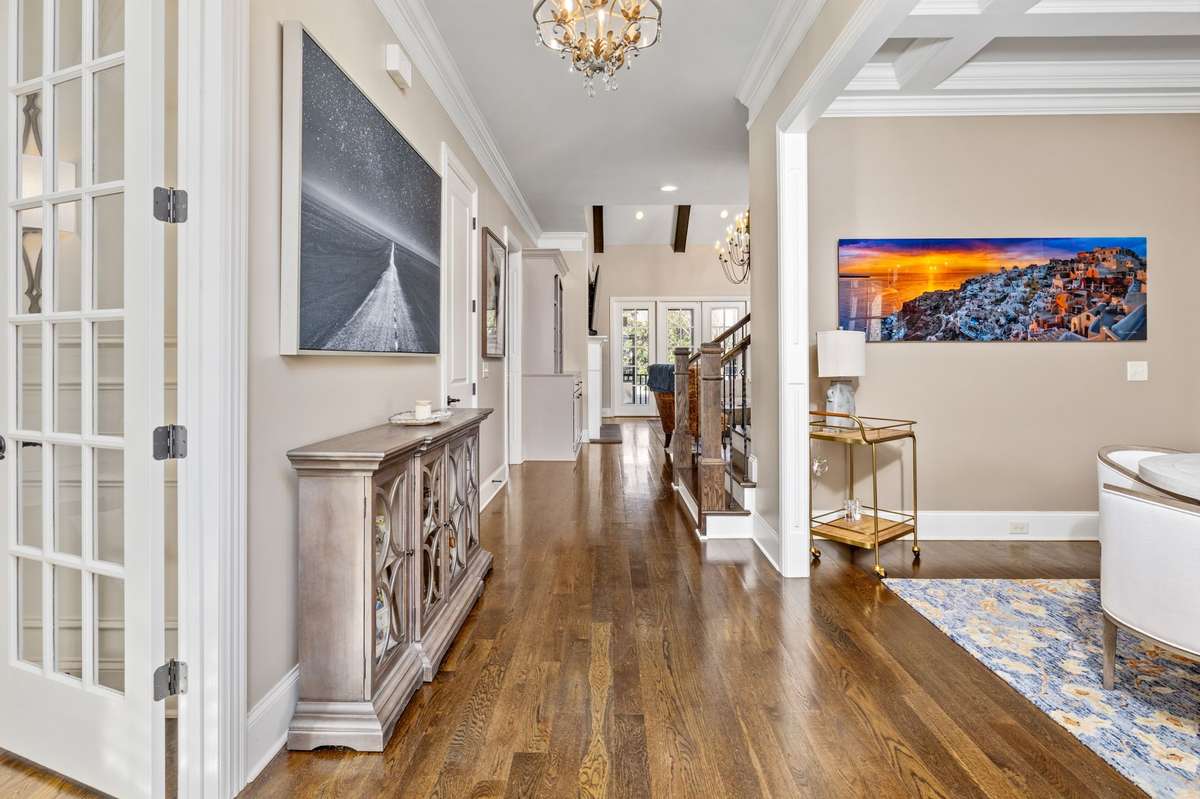 Hardwood floors, fresh paint and upgraded lighting