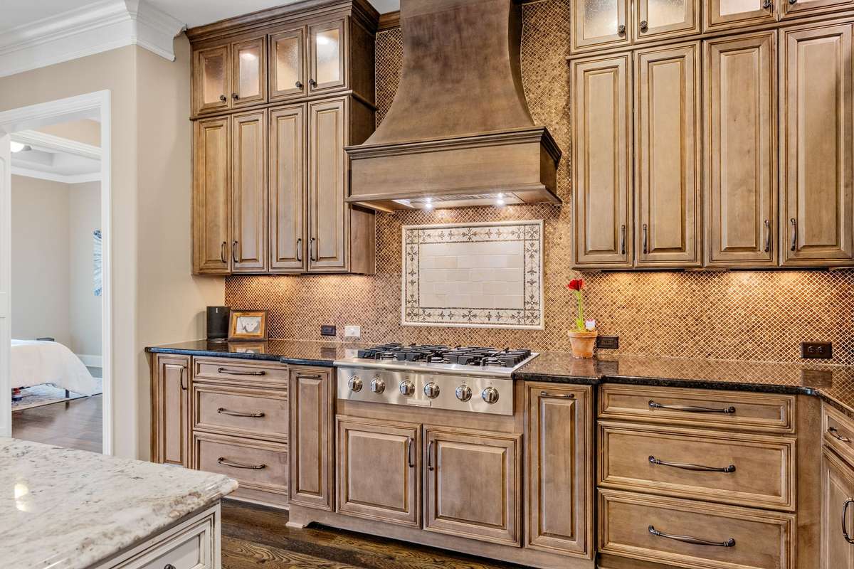 Stunning custom backsplash and cabinetry