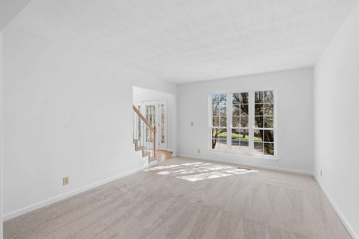 Large living room with triple window