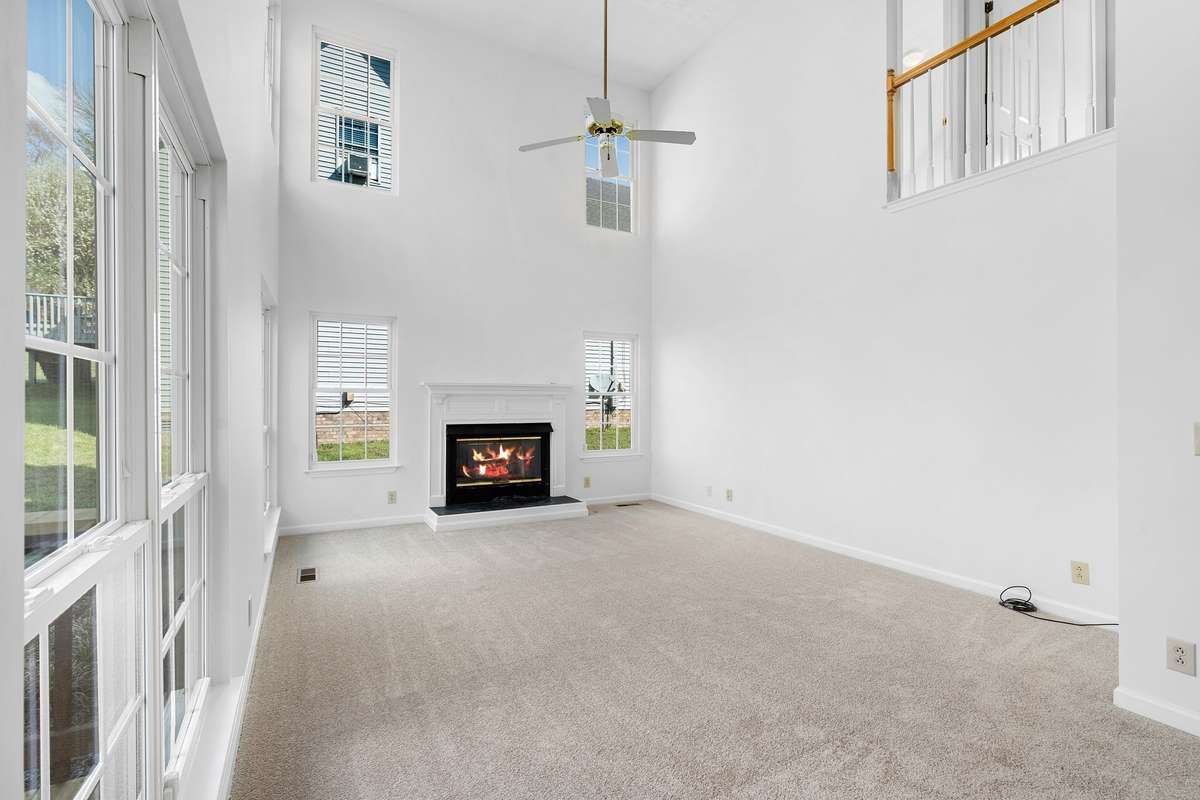Balcony from upstairs gets the view and daylight from the two-story windows