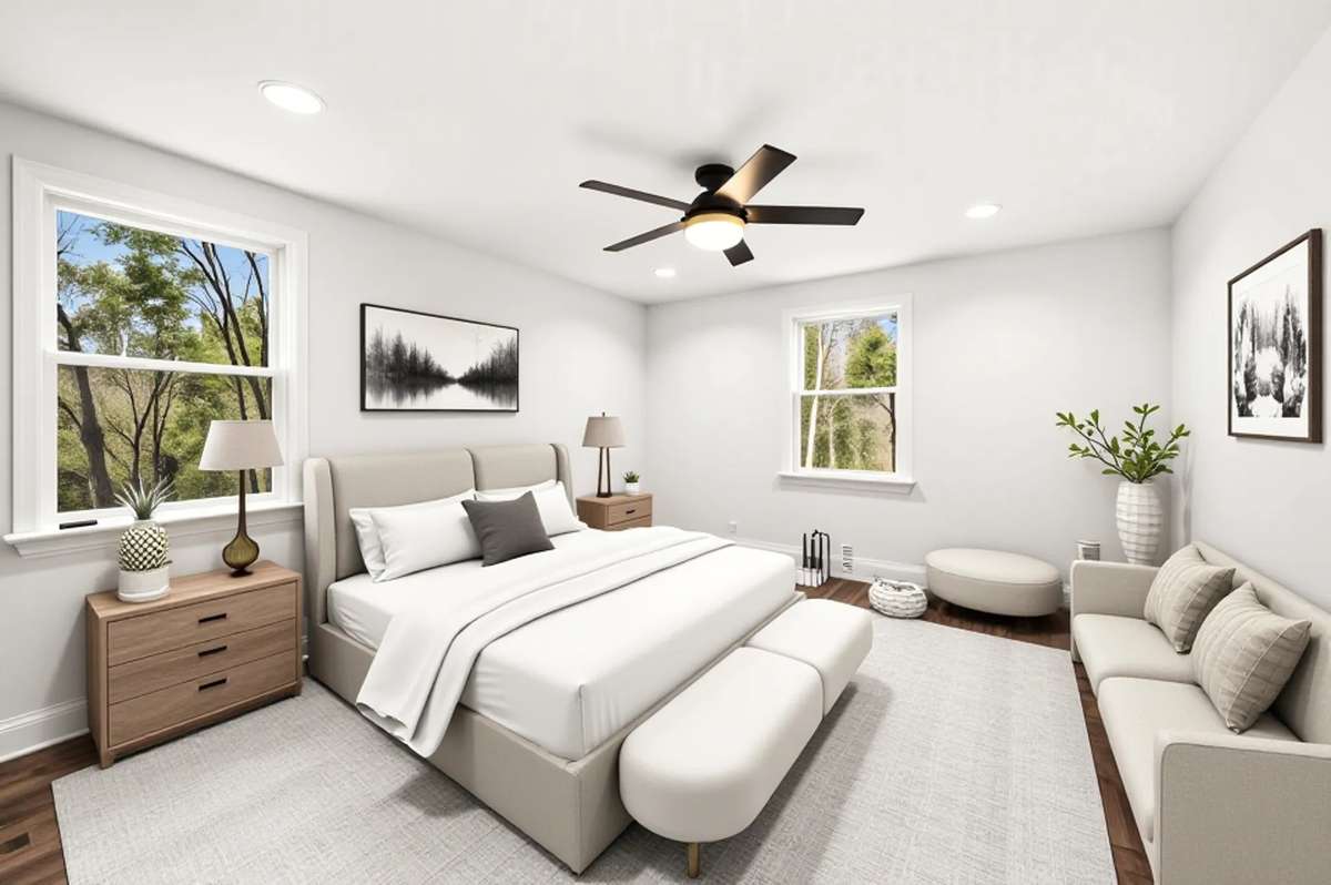 One of two spare bedrooms complete with a new ceiling fan.